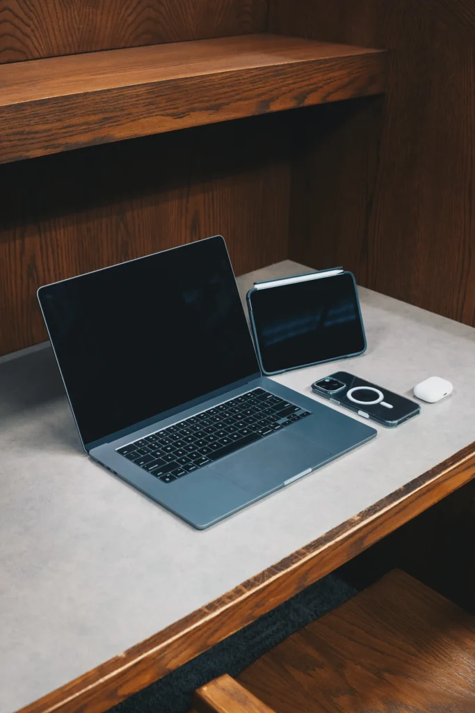 A laptop, tablet and smartphone on a desk